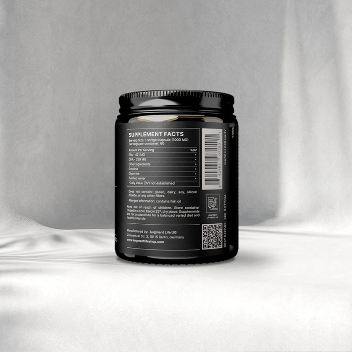 Black supplement container with label on a gray background