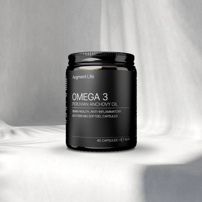 Black container of Omega 3 Peruvian Anchovy Oil on a white background